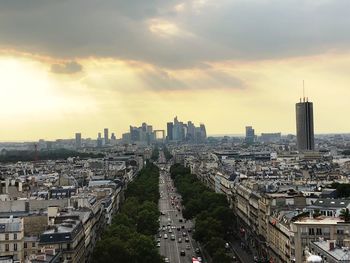 High angle view of city buildings during sunset