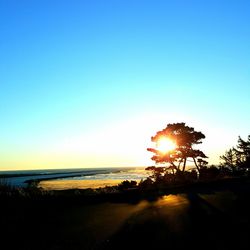 Scenic view of sea at sunset