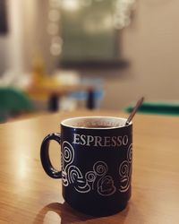 Close-up of coffee cup on table