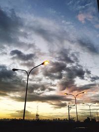 Low angle view of cloudy sky at sunset