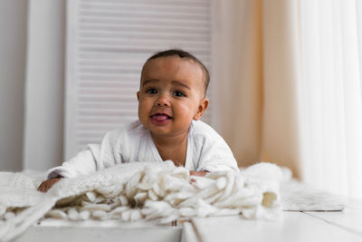 Portrait of cute baby at home