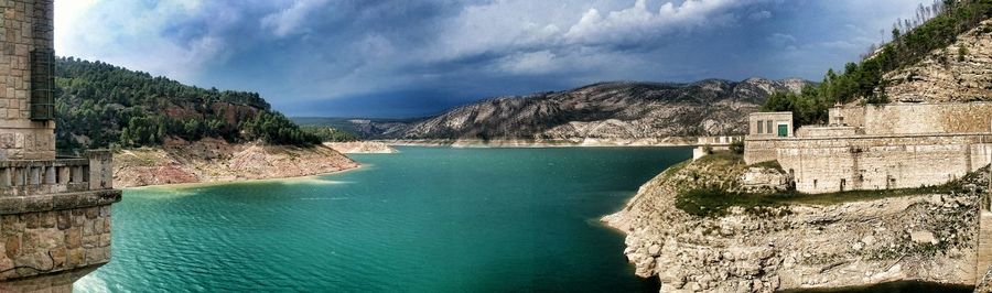 Scenic view of sea against cloudy sky