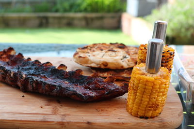 Close-up of meat on barbecue grill