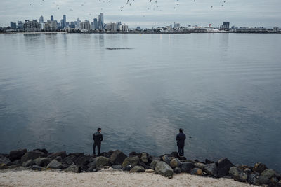 Woman standing on rocks