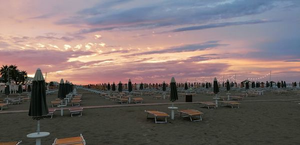 Panoramic view of beach against sky during sunset