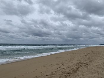 Scenic view of beach against sky