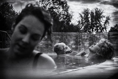 Portrait of dog by swimming pool