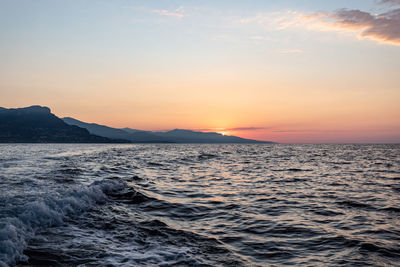 Scenic view of sea against sky during sunset