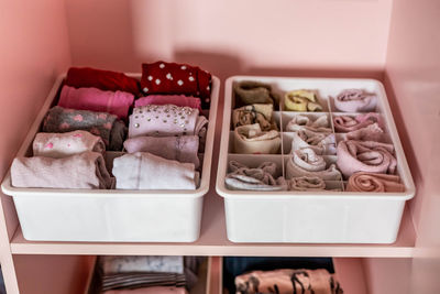 Close-up of clothes in containers