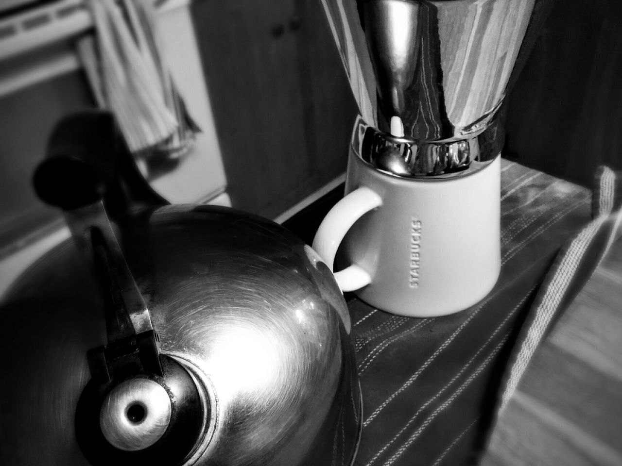 indoors, table, still life, close-up, drink, food and drink, high angle view, technology, home interior, wineglass, focus on foreground, selective focus, refreshment, spoon, domestic kitchen, kitchen utensil, no people, glass - material, bottle, music