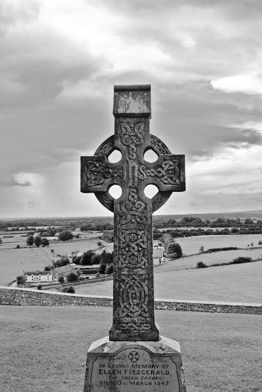 CLOSE-UP OF CROSS ON FIELD