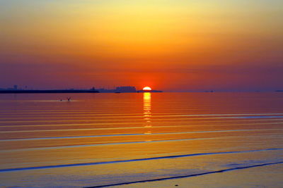 Scenic view of sea at sunset