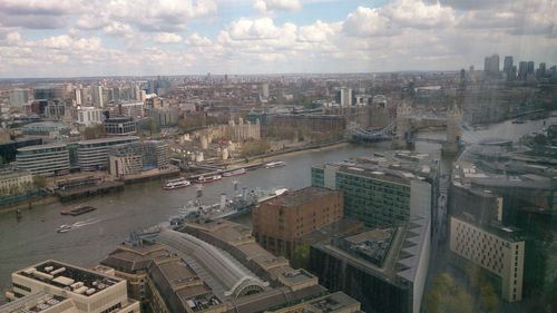 Aerial view of cityscape against sky