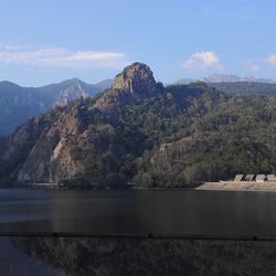 Scenic view of lake with mountains in background