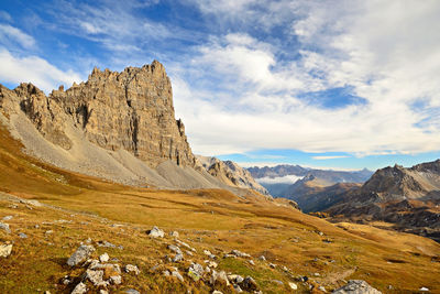 Scenic view of rocky mountains against sky