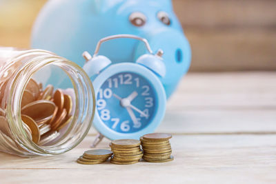 Close-up of coins on table