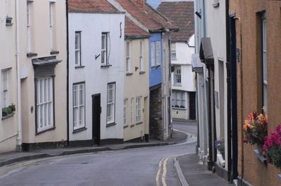 Alley amidst buildings in city