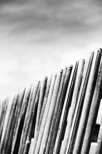 Close-up of wooden fence against sky