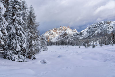 Scenic view of snowcapped mountains against sky