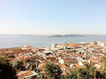 View of sea with buildings in background