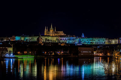 Prague architecture and charles bridge over vltava river at night, czech republic