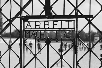 Full frame shot of metal gate at dachau concentration camp