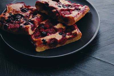 High angle view of pizza in plate on table