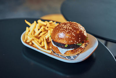 Close-up of burger in plate on table