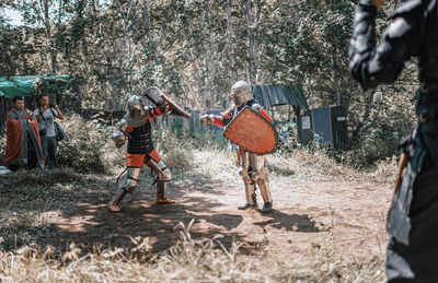 People playing in forest