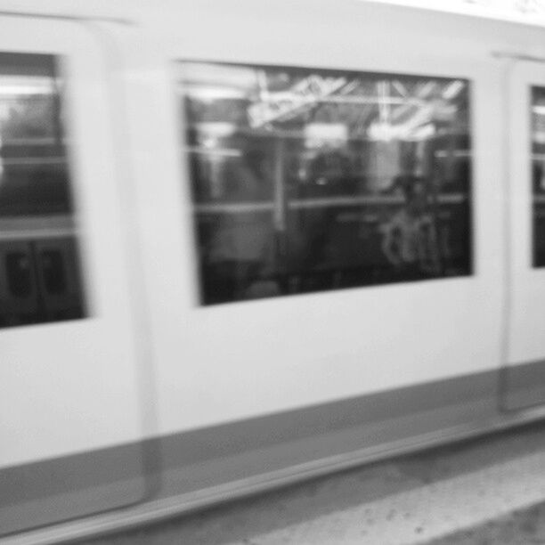 window, glass - material, transparent, indoors, transportation, public transportation, mode of transport, reflection, vehicle interior, built structure, architecture, glass, looking through window, day, focus on foreground, no people, train - vehicle, close-up, car, land vehicle