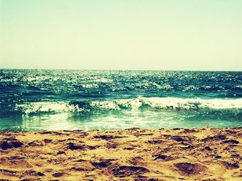 Scenic view of sea against clear sky