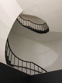 Low angle view of spiral staircase in building