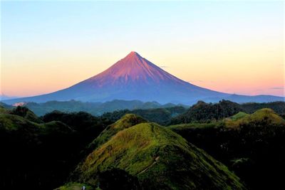 Scenic view of mountain against sky during sunset