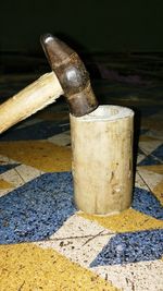 Close-up of padlock on wood
