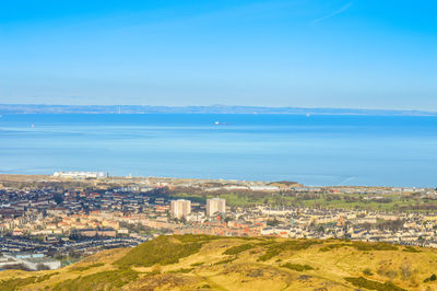 Scenic view of cityscape against clear sky