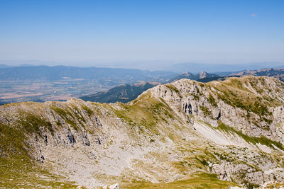 Scenic view of rocky mountains against sky in terminillo mountain, micigliano italy