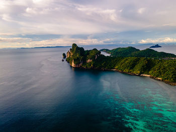 Scenic view of sea against cloudy sky