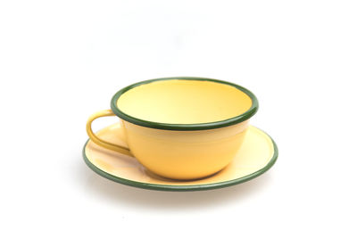 High angle view of tea cup against white background