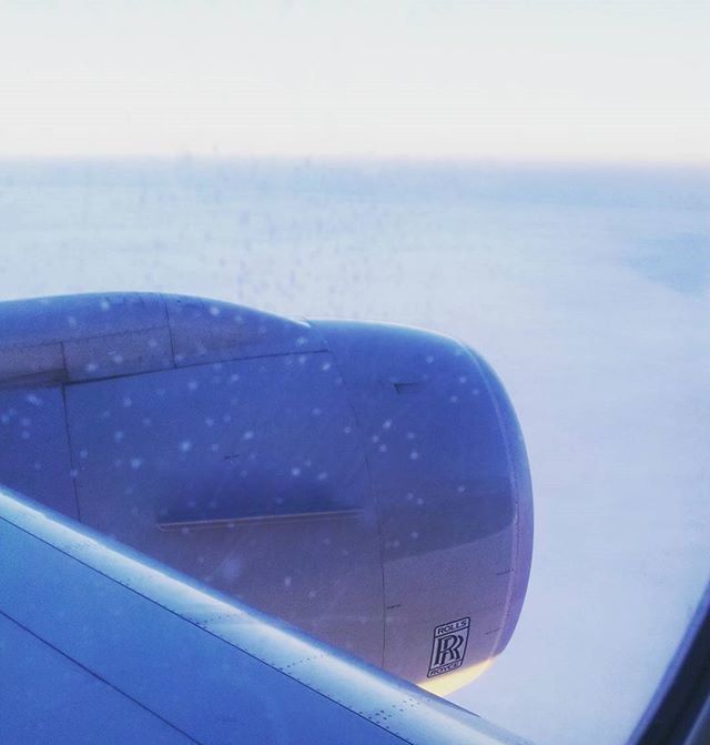 airplane, transportation, air vehicle, mode of transport, sky, part of, water, flying, sea, cropped, blue, aerial view, horizon over water, transparent, aircraft wing, window, glass - material, travel, scenics, mid-air