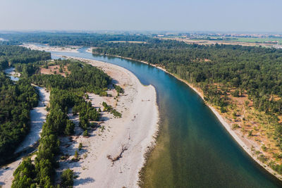 High angle view of road by sea against sky