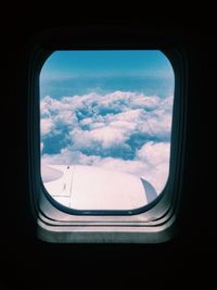 View of landscape seen through airplane window