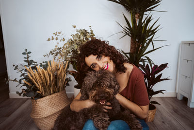 Portrait of woman with teddy bear