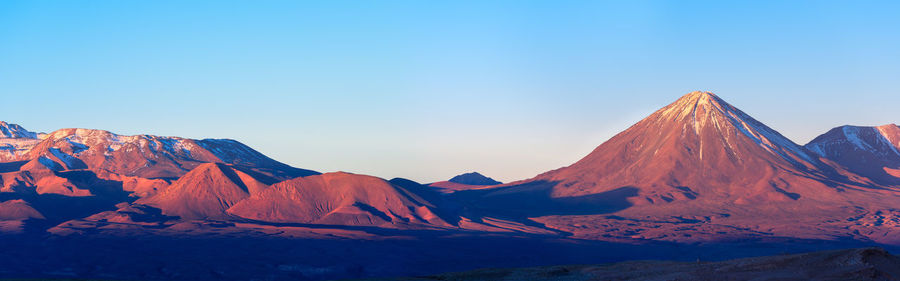 Panoramic view of licancabur volcano at sunset, san pedro de atacama, atacama desert, chile