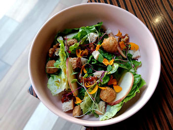 High angle view of salad in bowl on table