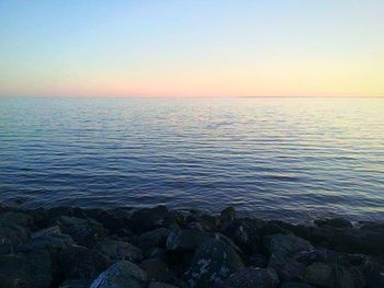 Scenic view of sea at sunset