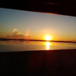 Scenic view of sunset over sea