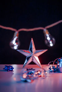 Close-up of christmas decorations on table