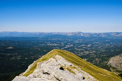 Scenic view of landscape against clear sky in amatrice, lazio italy