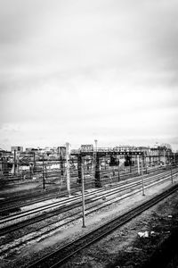 View of train on railway tracks against sky