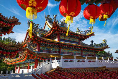 Traditional temple against sky in city